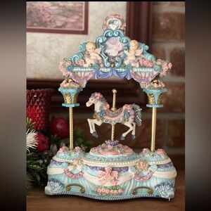Rare Vintage 1970's Hand
Painted Cherub Musical
Carousel Featuring
Motion Horse